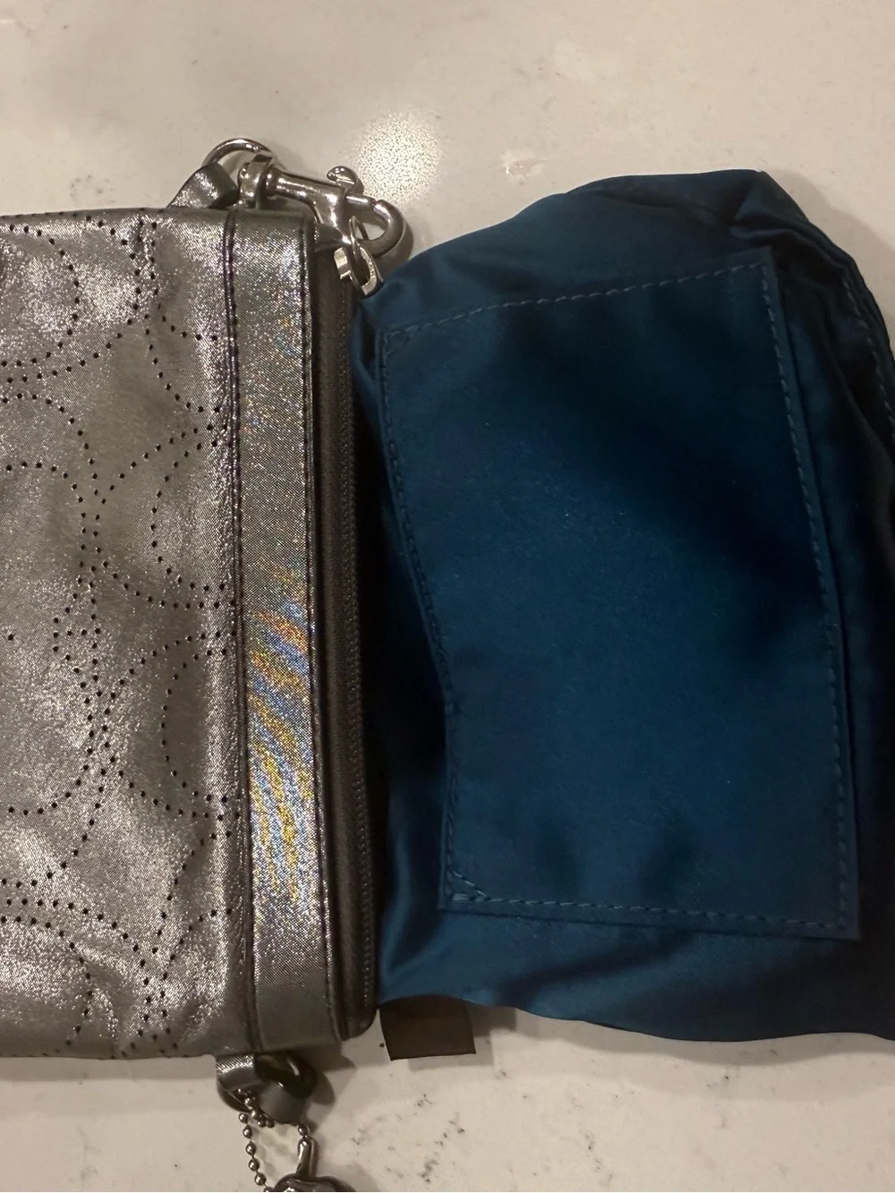Coach Metallic Pewter Perforated Wristlet